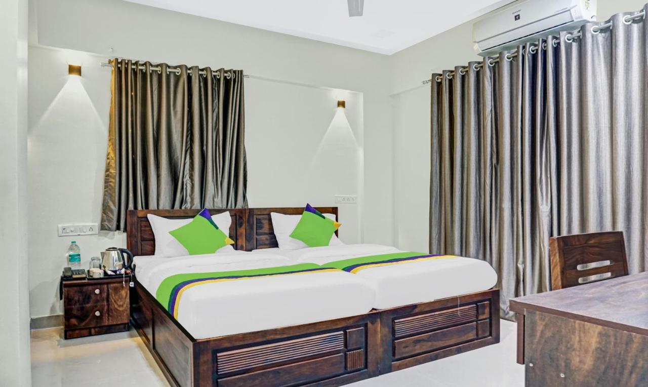 Hotel Treebo Tulip à Pune Extérieur photo